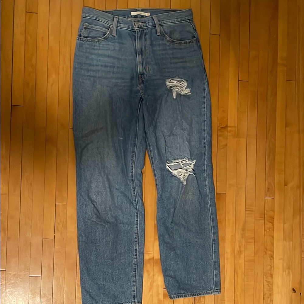 Levi's High Rise Blue Jeans with Distressed Details